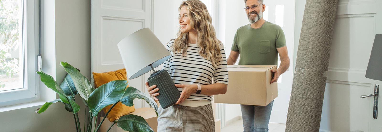 A couple moving into their new home